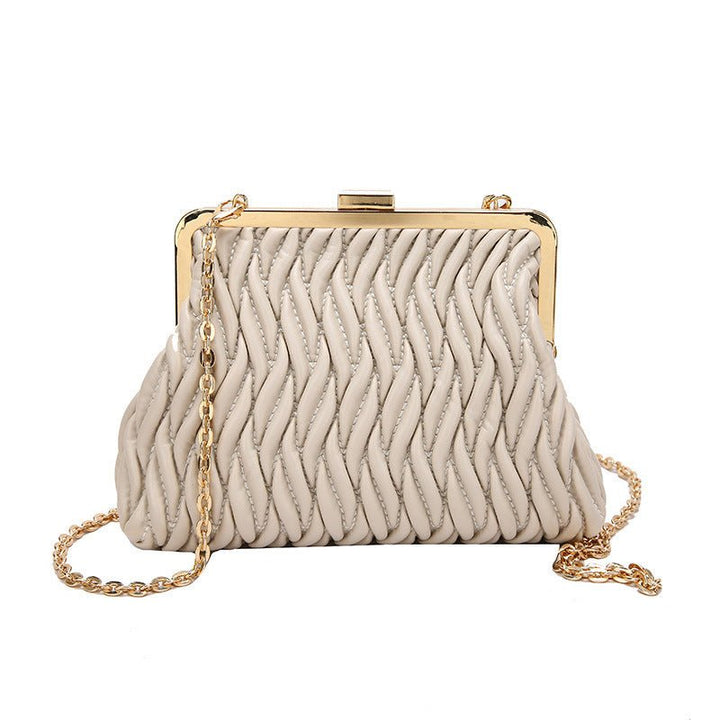 Chain Shoulder Texture Lock Pleated Handbag by LUXE AHMAR – Available at LUXE AHMAR