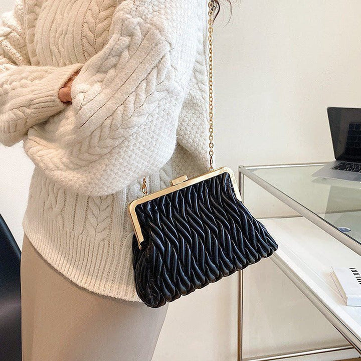 Chain Shoulder Texture Lock Pleated Handbag by LUXE AHMAR – Available at LUXE AHMAR